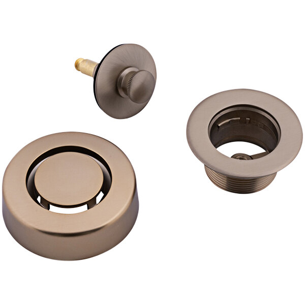 A Dearborn Dblue trim kit with a circular metal stopper in champagne bronze with a hole in the center.