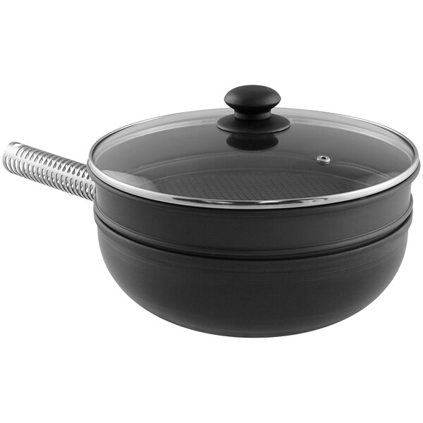 A black LloydPans stir fry pan with a glass lid.