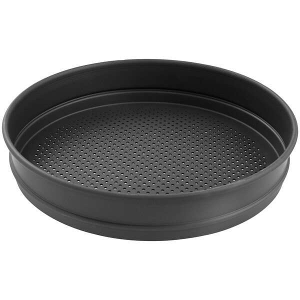 A black round LloydPans aluminum steamer insert with holes in it.