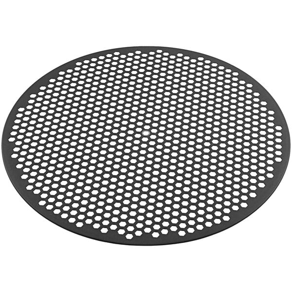 A black round metal pizza disk with hexagonal holes.