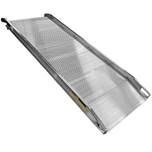 A silver metal B&P Manufacturing walk ramp with a yellow label.