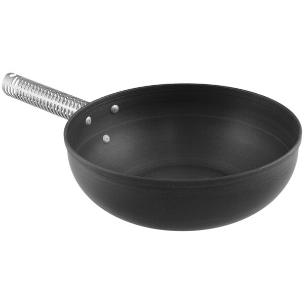 A black LloydPans stir fry pan with a handle.