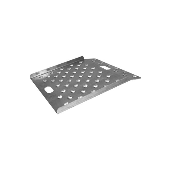A metal plate with holes designed to be used as a curb ramp.