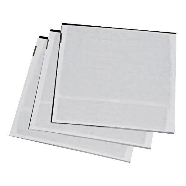 A stack of three black and white PestWest glue boards.