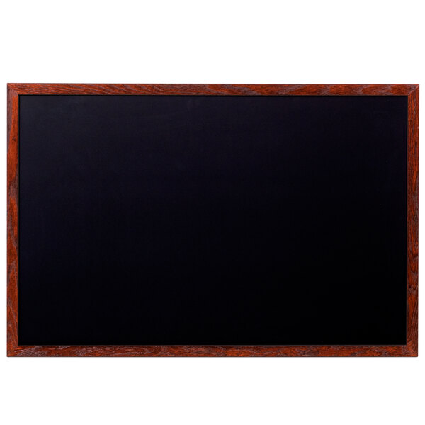 A mahogany-framed black chalk board.