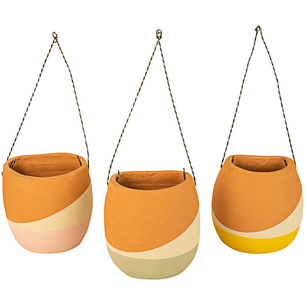 A group of three Kalalou wall pocket planters with different colors.