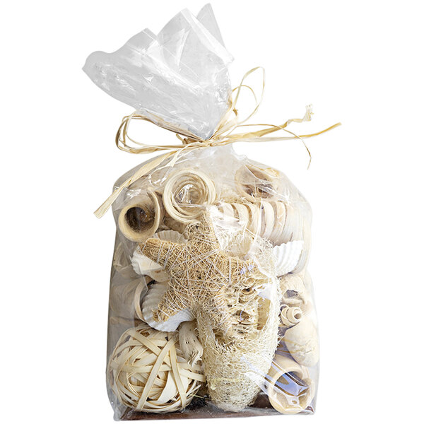 A white bag of Kalalou dried coastal filler with brown shells and starfish.