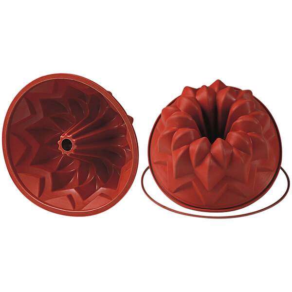 A red silicone bundt cake mold.