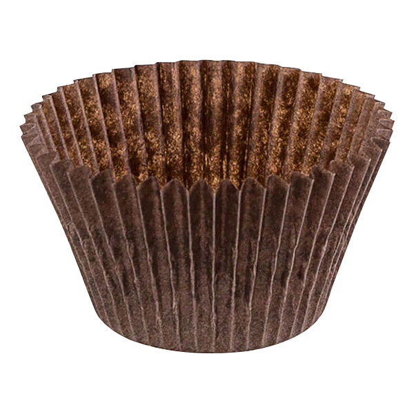 A close-up of a brown paper Novacart fluted baking cup.