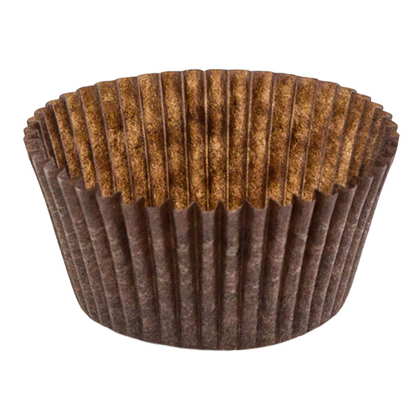 A close up of a brown Novacart fluted baking cup with a brown rim.