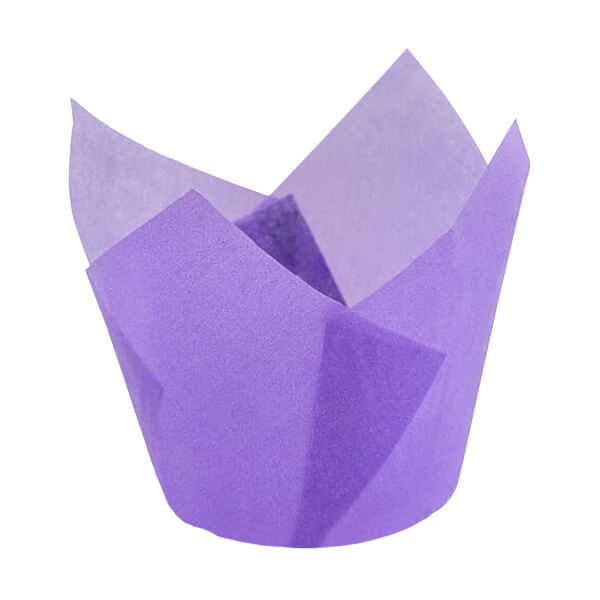 A purple triangle shaped Novacart baking cup with a folded edge.
