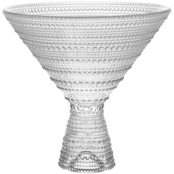 A clear Fortessa Jupiter martini glass with a triangular base.