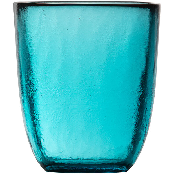 A Fortessa Los Cabos lagoon blue glass tumbler on a white background.