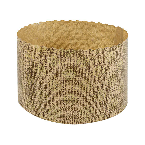 A brown paper baking mold with a gold trim and scalloped edges.