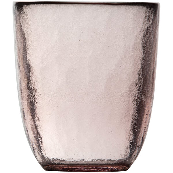 A close up of a Fortessa Los Cabos pink glass tumbler with a pink rim.