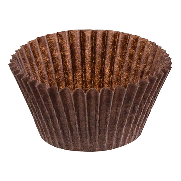 A close up of a brown paper Novacart fluted baking cup.