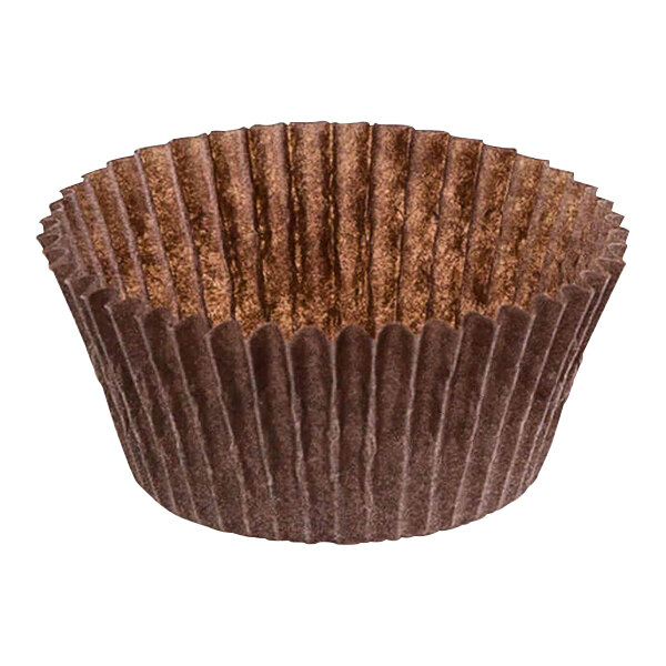 A close up of a brown Novacart fluted baking cup.