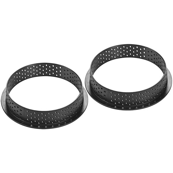 Two black circular thermoplastic composite rings with holes.