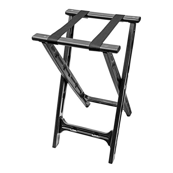 A black plastic tray stand with black straps on a table.