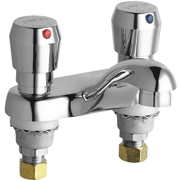 A Chicago Faucets chrome deck-mounted metering faucet with two valves and a 4" spout.