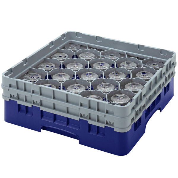 A navy blue and grey plastic Cambro glass rack with clear plastic cups inside.