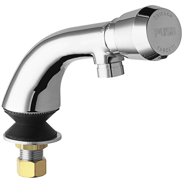 A close-up of a silver Chicago Faucets metering faucet with a black rubber base.