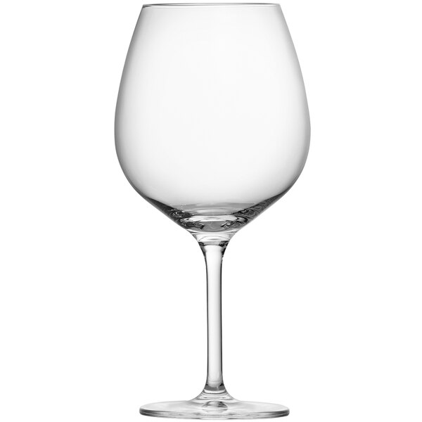 A close-up of a clear Schott Zwiesel Burgundy wine glass with a stem.