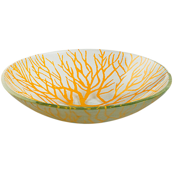 A Rosseto Kalderon round glass bowl with yellow and orange branches on it.