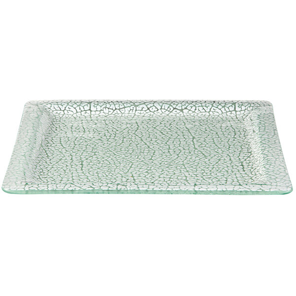 A white square glass platter with a crackled surface.