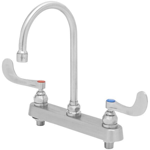 A silver Eversteel deck-mount faucet with wrist action handles.