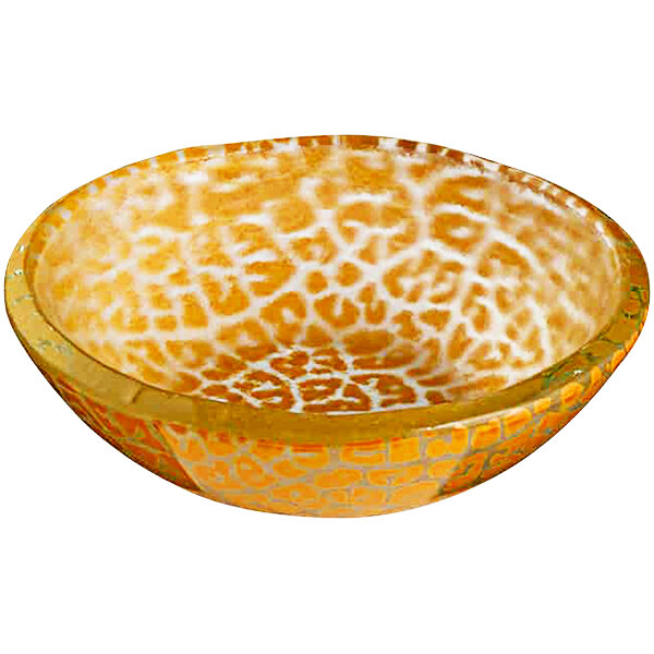A yellow glass bowl with a leopard print design.