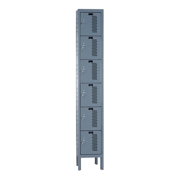 A tall grey Hallowell metal box locker with six compartments and ventilated doors.