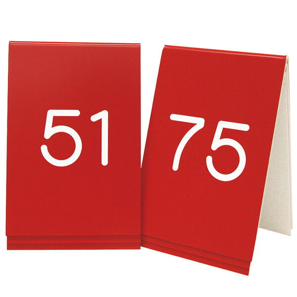 Two red Cal-Mil table tents with white numbers reading "51 to 75"