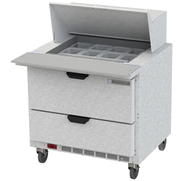 A Beverage-Air refrigerated sandwich prep table with 2 drawers open on a counter.