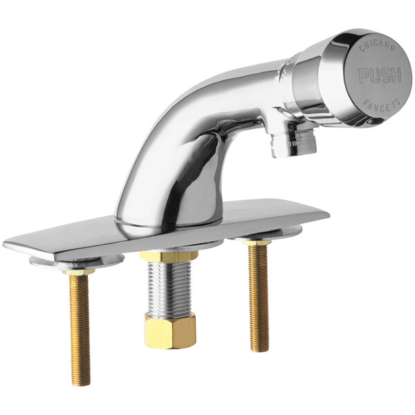 A close-up of a silver Chicago Faucets metering faucet with brass bolts.