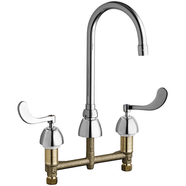 A chrome Chicago Faucets deck-mounted medical faucet with two lever handles.