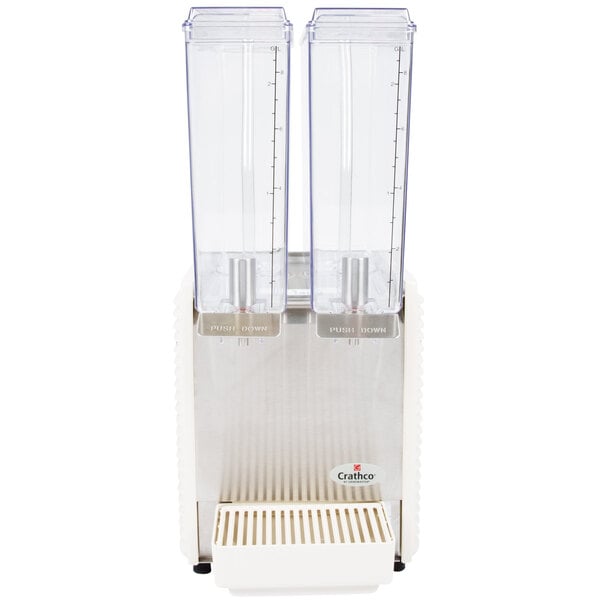 A white and silver Crathco beverage dispenser with two clear containers.
