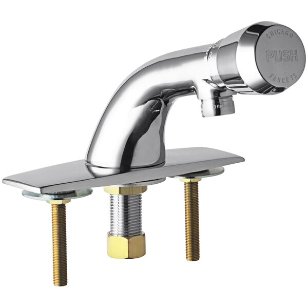 A Chicago Faucets deck-mounted metering faucet with a chrome finish and brass spout.