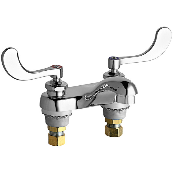 A Chicago Faucets deck-mounted medical faucet with two wristblade handles and a brass spout.