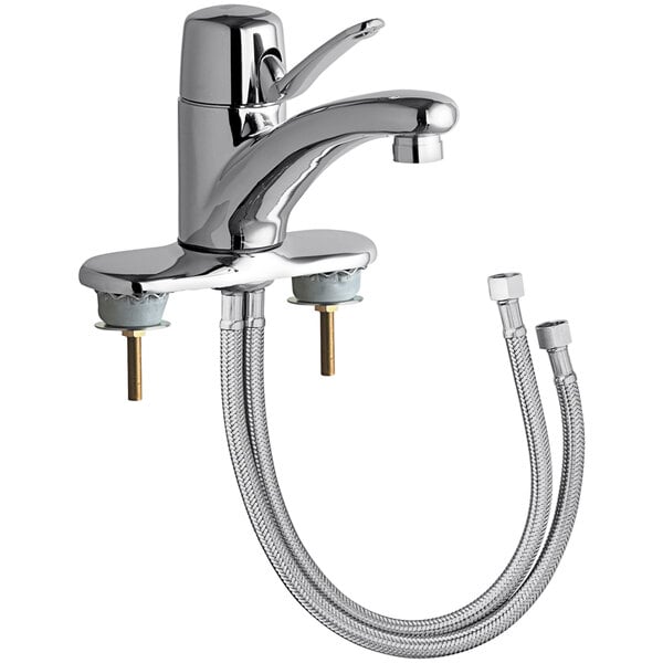 A silver Chicago Faucets deck-mounted faucet with a hose attached.