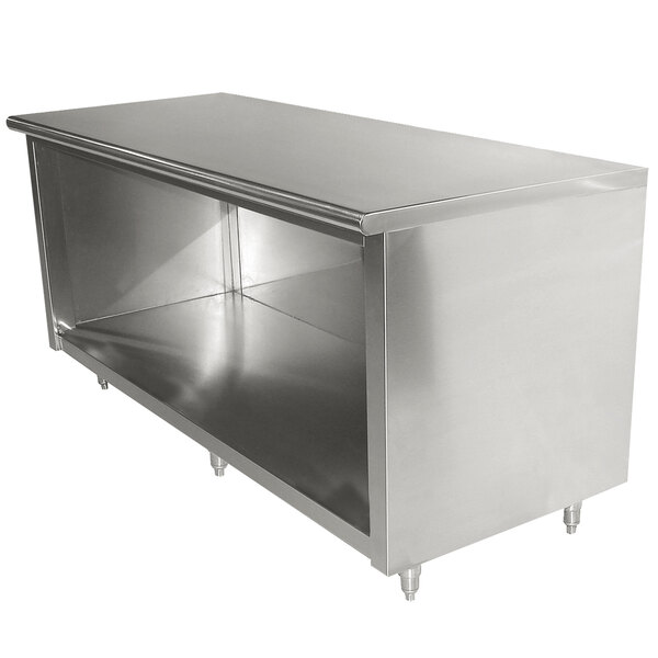 An Advance Tabco stainless steel cabinet base work table with a shelf.