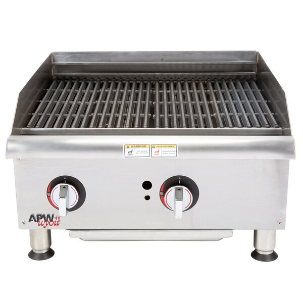 A stainless steel APW Wyott charbroiler with two knobs.