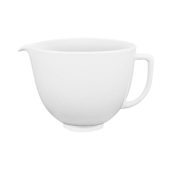 A white ceramic mixing bowl with a handle.