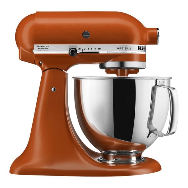 A KitchenAid Artisan Series stand mixer in scorched orange with a stainless steel bowl.