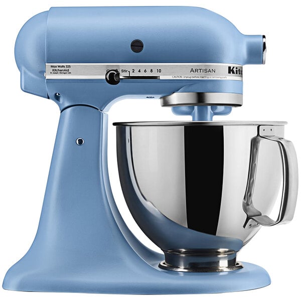 A blue KitchenAid Artisan mixer with a stainless steel bowl.