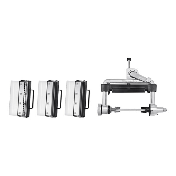 A KitchenAid vegetable sheet cutter and noodle blade attachment set with four different tools.
