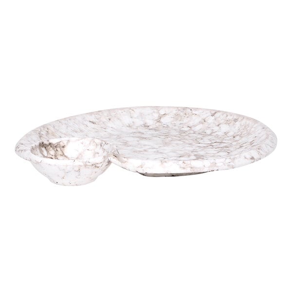 A brown marble Elite Global Solutions plate with an embossed bowl.
