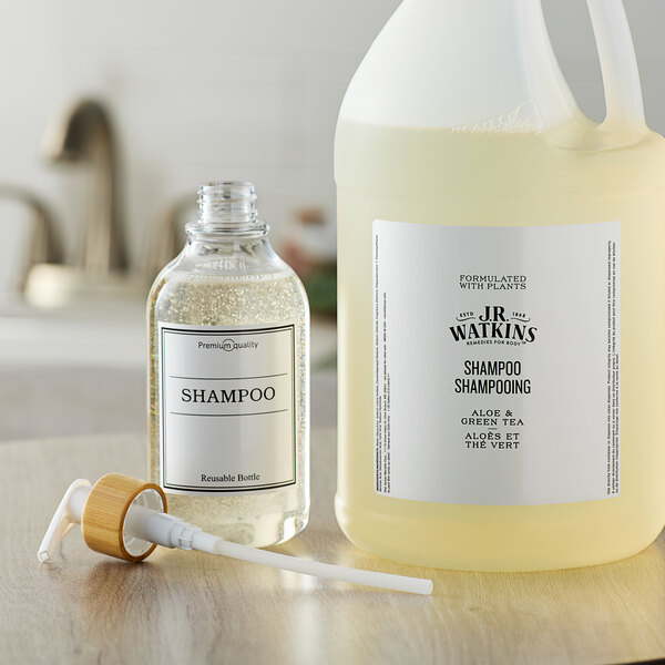 A white bottle of JR Watkins Aloe and Green Tea Shampoo with a white label.