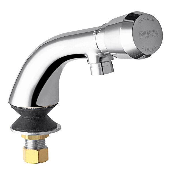A silver Chicago Faucets metering faucet with a gold nut.