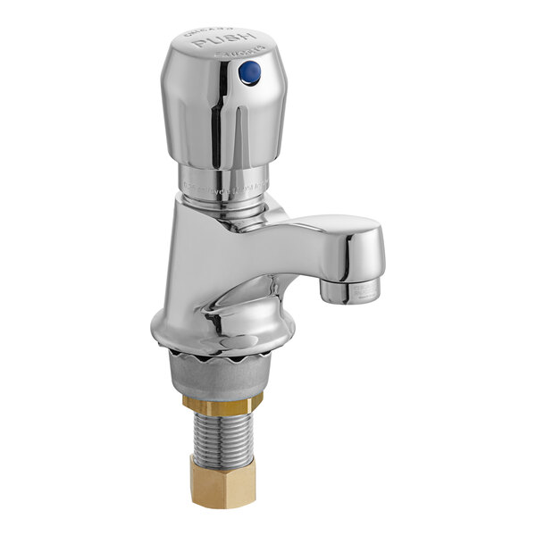 A Chicago Faucets deck-mounted metering faucet with a chrome finish and a blue handle.